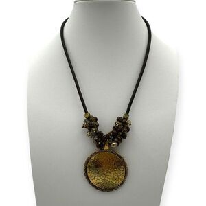 Vintage Necklace costume approx 17 inches, statement with gold colored circle an